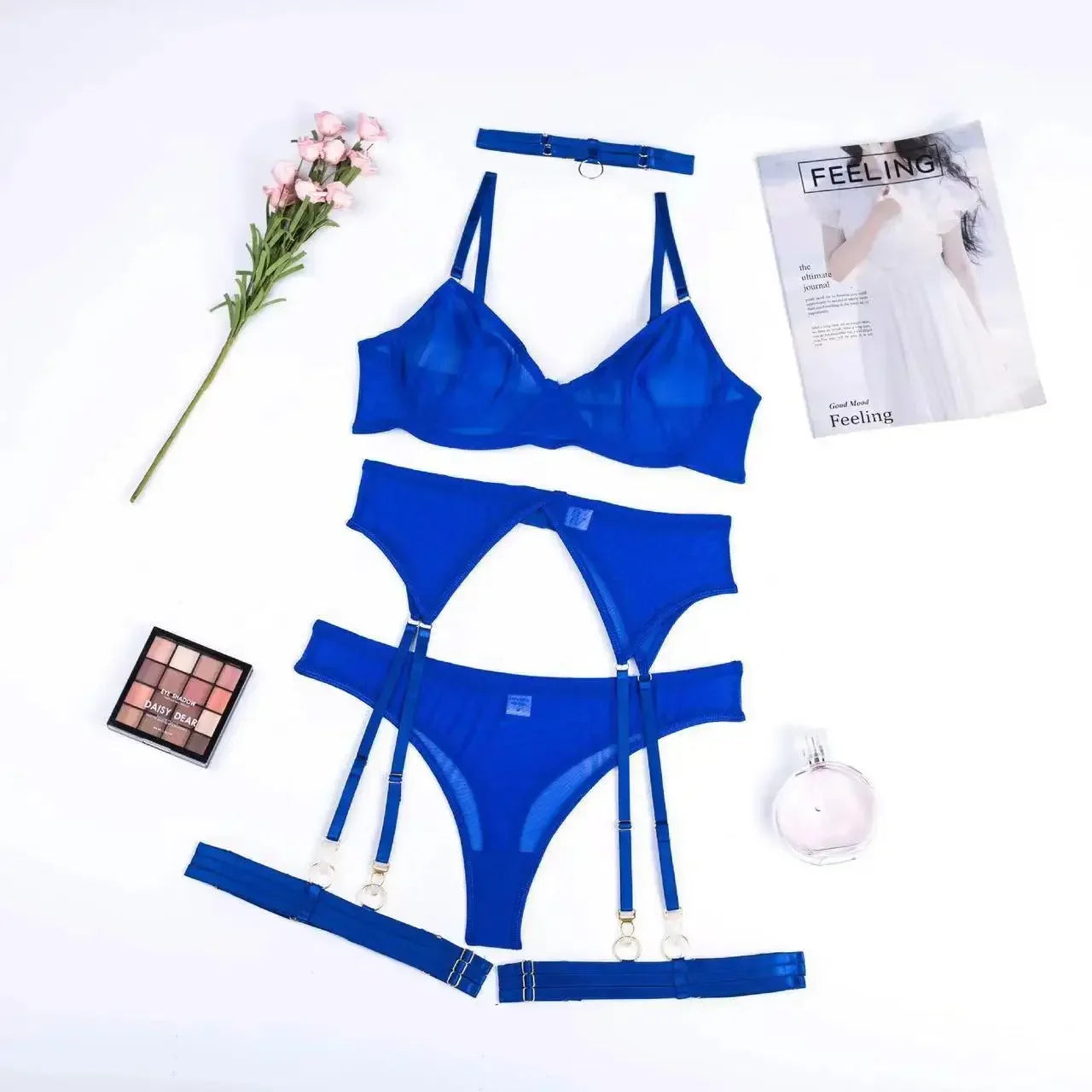 Blue lingerie set with bra, briefs and garter pieces