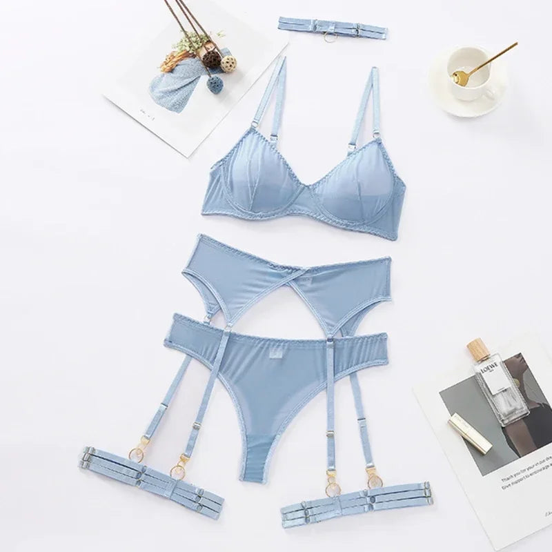Light blue lingerie set with bra, briefs and garter pieces